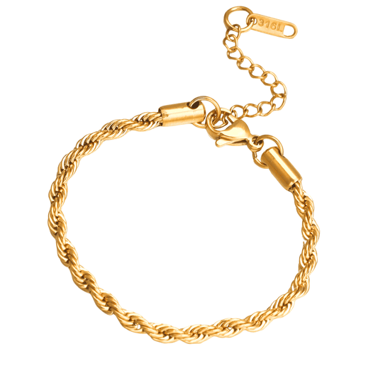 Gold bracelet on a white background