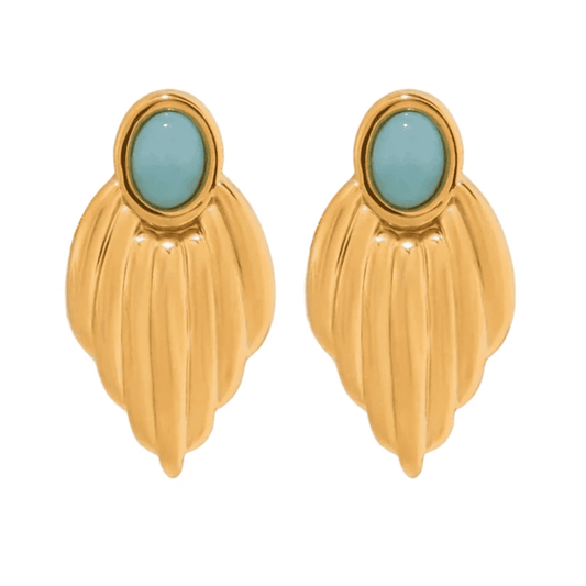 Gold earrings with turquoise stones on a white background