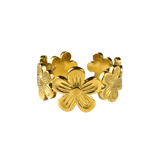 Gold floral ring on a white background
