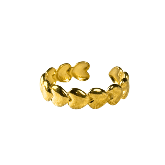 Gold ring with heart-shaped designs on a white background