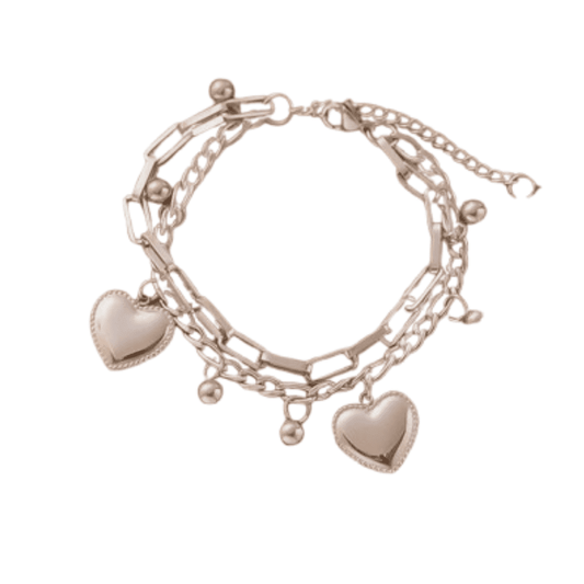Stackable bracelet with heart charms on a white background