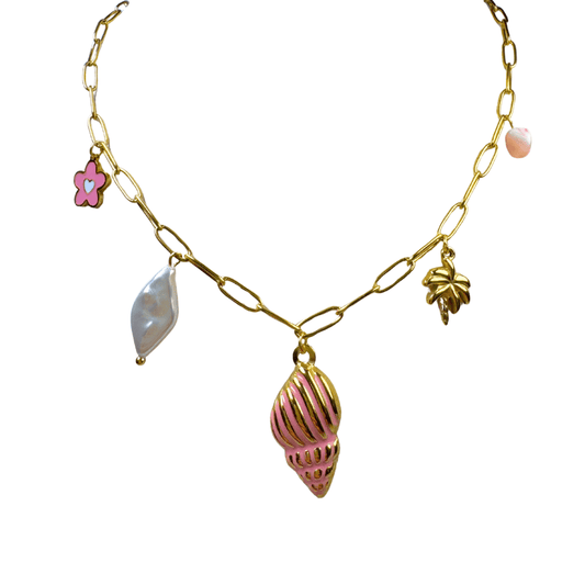 Gold necklace with various charms on a white background