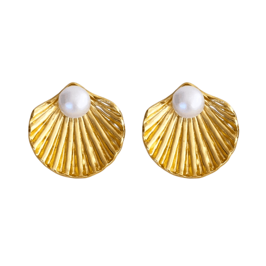 Gold shell-shaped earrings with pearls on a white background