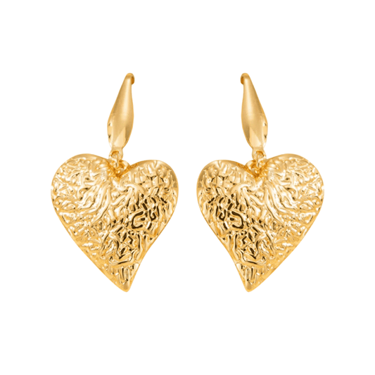 Gold heart-shaped earrings on a white background