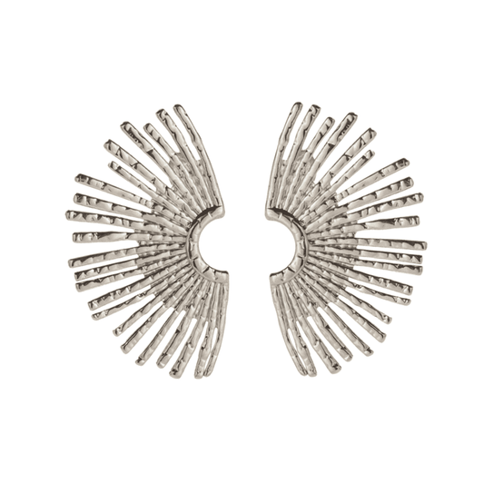 Pair of silver sunburst earrings on a white background