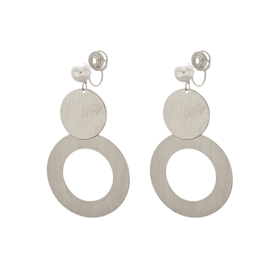 Pair of earrings with circular designs on a white background