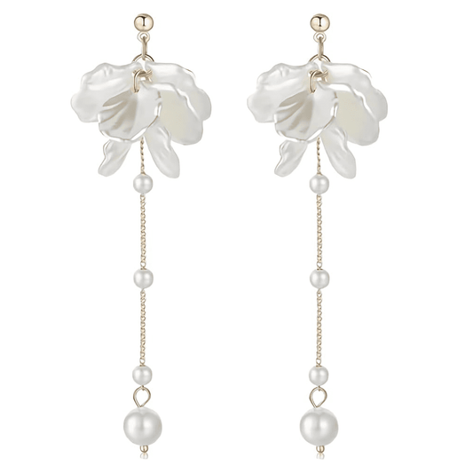 Floral earrings with pearl details on a white background