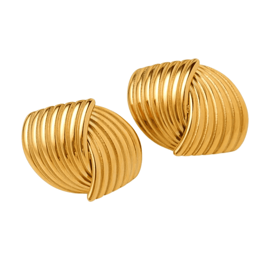 Pair of gold spiral earrings on a white background