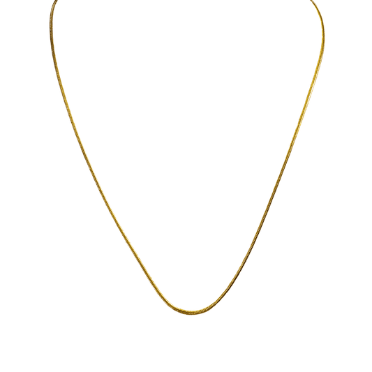 Gold necklace on a white background