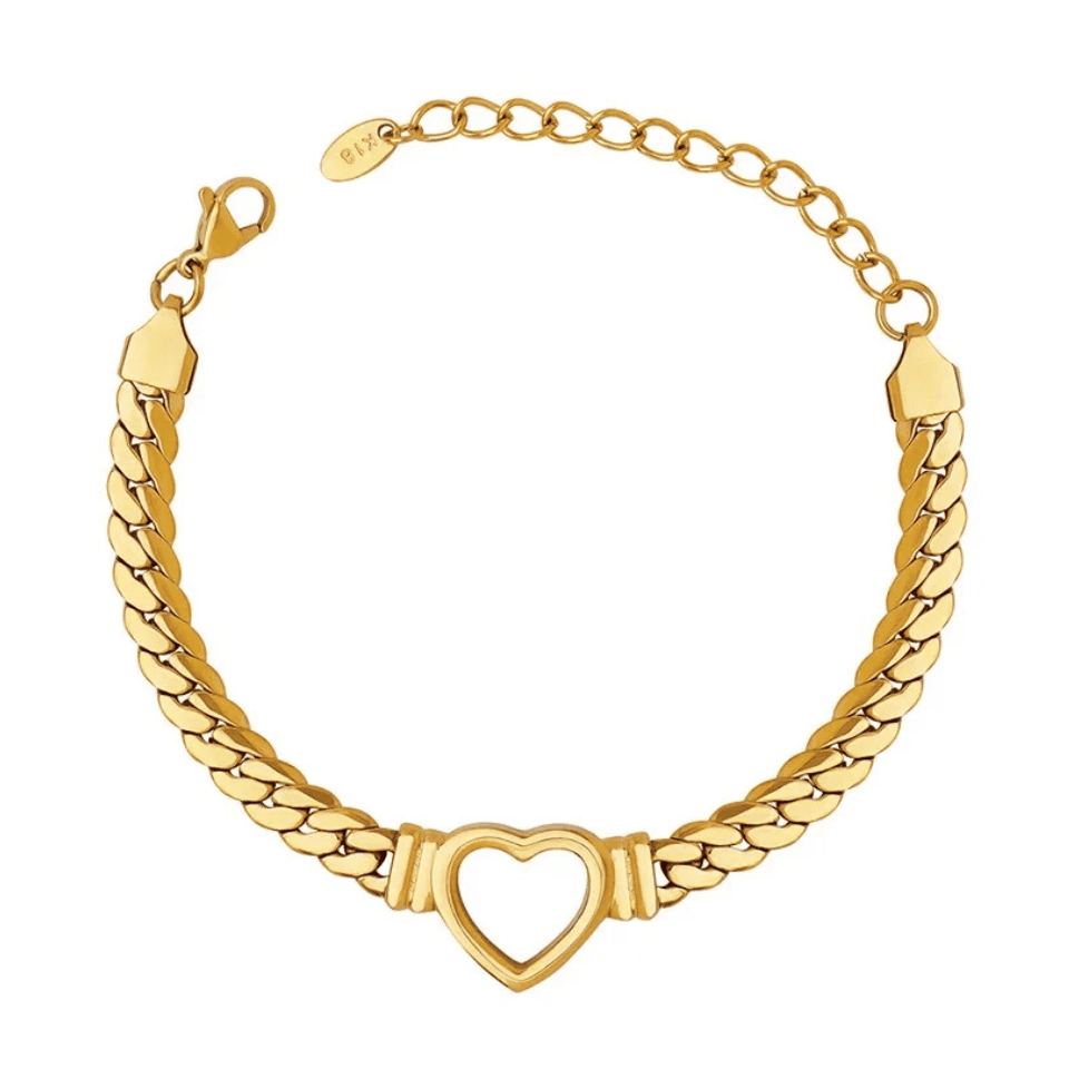 Gold chain bracelet with a heart-shaped clasp on a white background