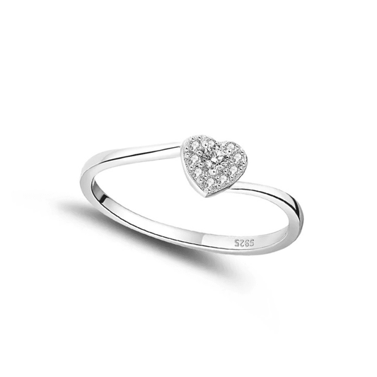 Silver ring with a heart-shaped diamond on a white background