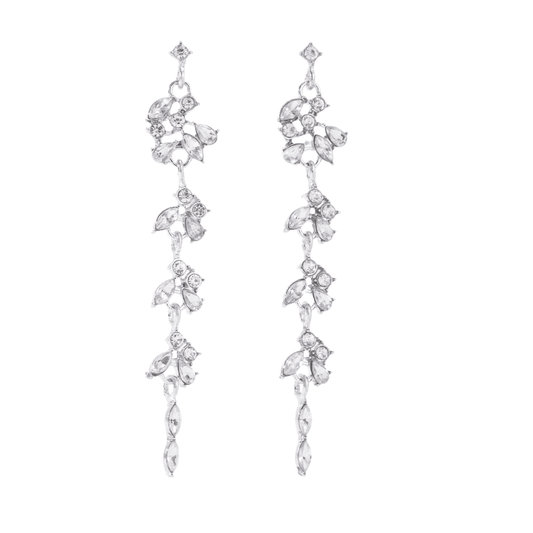Pair of silver earrings with clear stones on a white background