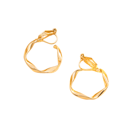 Gold hoop earrings on a white background