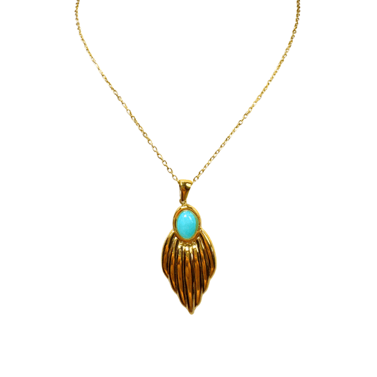 Gold necklace with a turquoise pendant on a white background