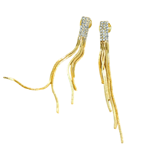 Gold tassel earrings with crystal embellishments on a white background