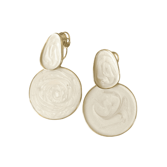 Pair of gold earrings with a white stone on a white background