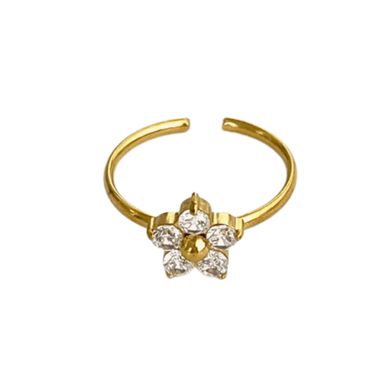 Gold ring with a floral design featuring clear stones on a white background